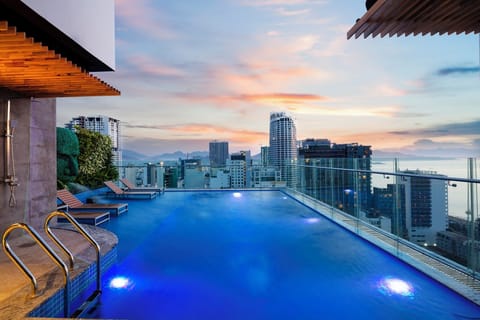 Outdoor pool, open 6:00 AM to 10:00 PM, pool umbrellas, sun loungers