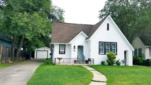 Front of the house with the driveway on the left for parking