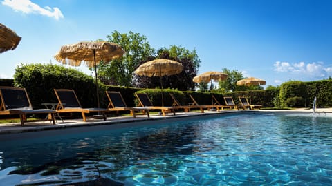 Seasonal outdoor pool, pool umbrellas, sun loungers