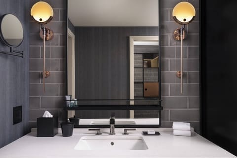 Designer toiletries, hair dryer, bathrobes, towels