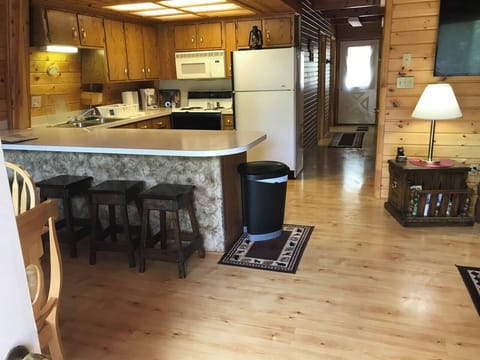 Walk in the front door to a large break room with kitchen dining and living area Tv area for your enjoyment 