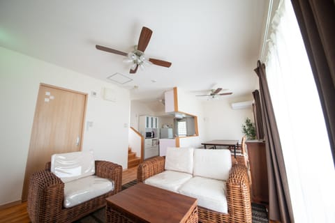Pine House in ISHIGAKI | Living room | Flat-screen TV