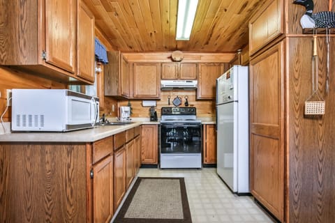 Enjoy a nice home cooked meal away from home with this amazing kitchen!