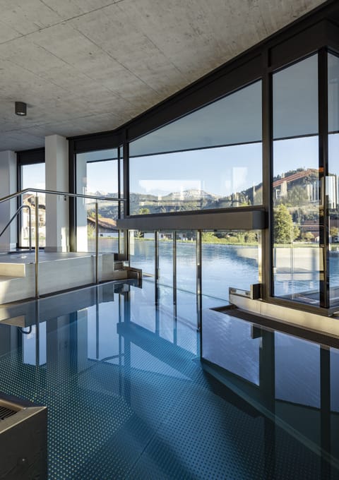 Indoor pool, 2 outdoor pools, open 7:00 AM to 8:00 PM, pool umbrellas