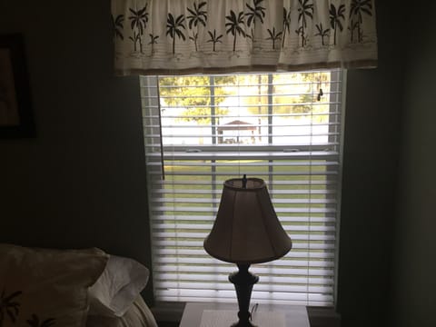 Master Bedroom looking out at the dock and the lake.