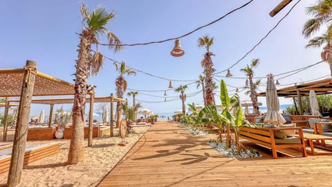 Private beach, sun loungers, beach umbrellas, beach volleyball