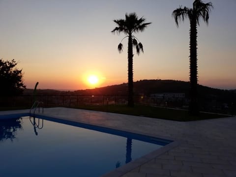 Seasonal outdoor pool, pool umbrellas, sun loungers