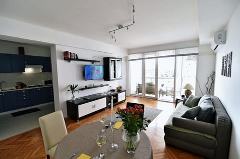 Apartment, 2 Bedrooms, Balcony | Living room | Flat-screen TV