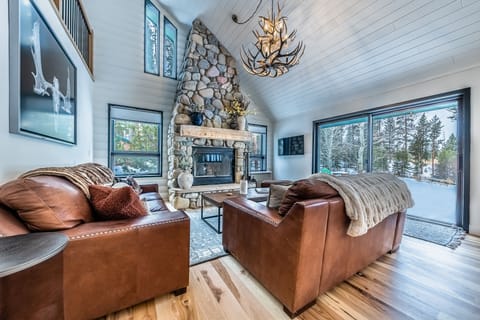 Living room - Great living room with beautiful rock chimney, with great natural light.