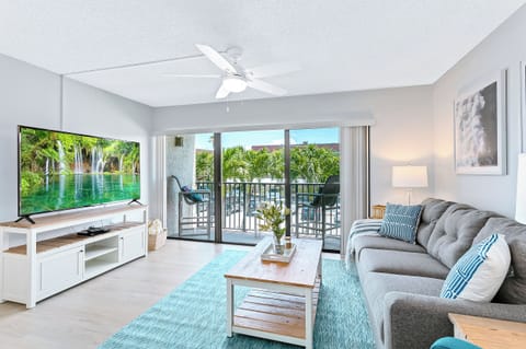 Beautiful, bright living room with a 65-inch TV—newly renovated!