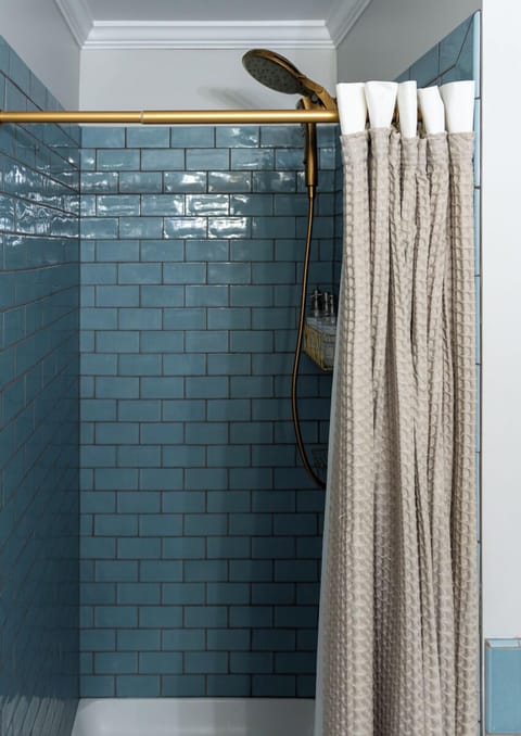 The Garner Suite | Bathroom | Hair dryer, towels