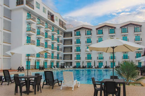 2 outdoor pools, open 9:00 AM to 9:30 PM, free cabanas, pool umbrellas