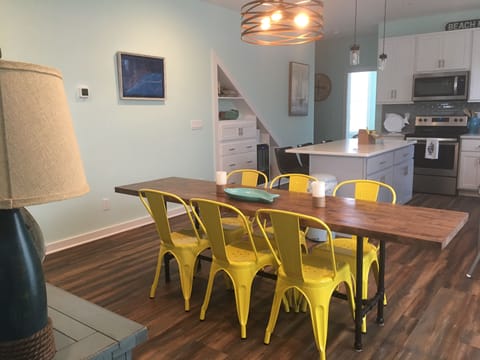 Dining Area & Kitchen (extra chairs available throughout house).   