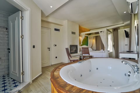 Deluxe Room, Fireplace | Premium bedding, blackout drapes, soundproofing, free WiFi