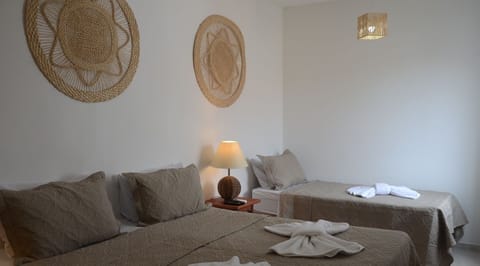 Triple Room | Bathroom amenities | Shower, hair dryer, towels, soap