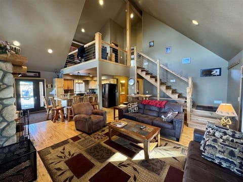 Living room with wood burning fireplace