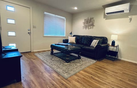 Leather couch and ottoman.