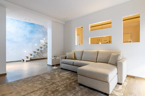 Standard Suite | Living area | Flat-screen TV