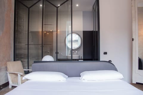 Premium bedding, down comforters, memory foam beds, in-room safe