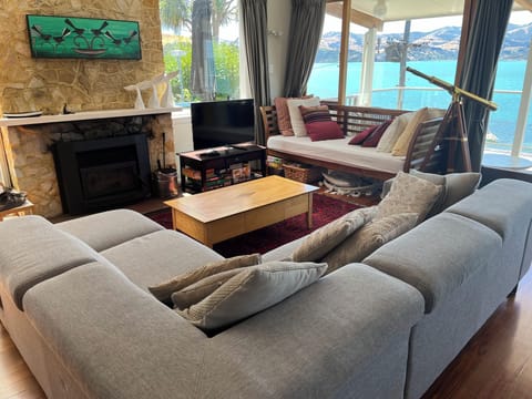 Relaxing space by fire with views out to sea