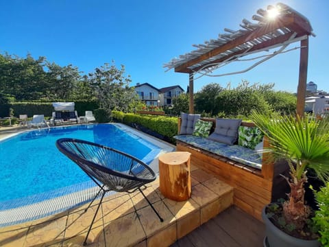 Seasonal outdoor pool, open 9:00 AM to 9:00 PM, sun loungers