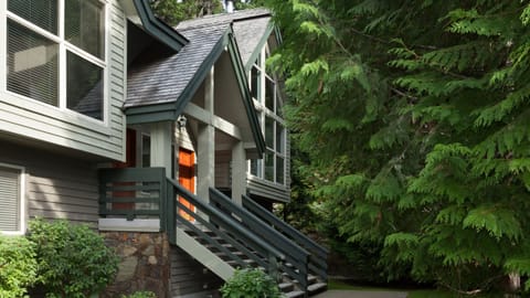 - Charming townhouse nestled among tall evergreens  
- Peaceful Whistler retreat with cozy alpine design  
- Private entry surrounded by mountain serenity  