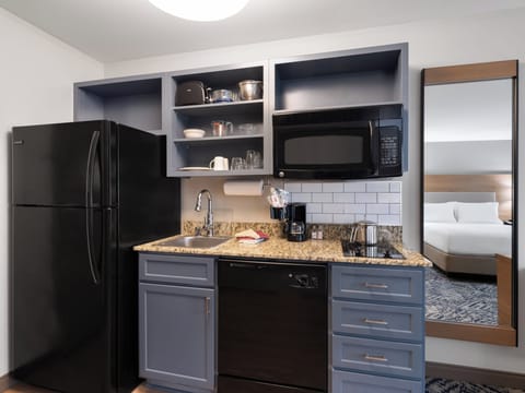 Desk, blackout drapes, iron/ironing board, free cribs/infant beds