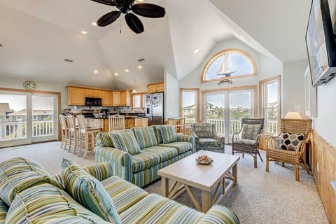 Top-Level Living Room with Deck Access