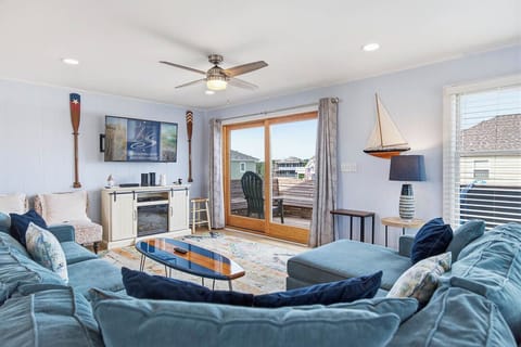Top-Level Living Room with Deck Access