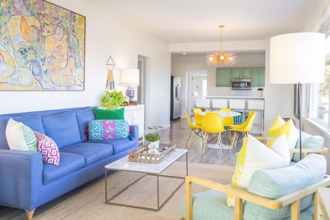 Living Room—The living room features a pull-out queen size sleeper sofa with a plush new gel-foam mattress, along with three comfortable easy chairs and large-screen TV.