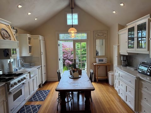 kitchen, viking gas stove/oven, vintage pine table, fully stocked
