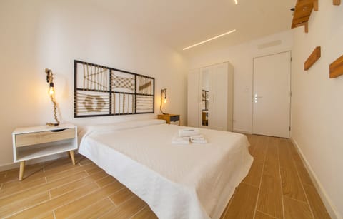 Apartment (1 Bedroom) | 1 bedroom, iron/ironing board, cribs/infant beds, bed sheets