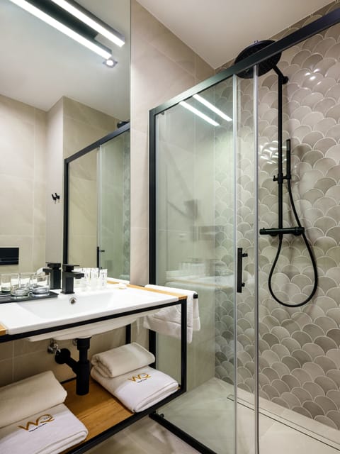 Shower, rainfall showerhead, eco-friendly toiletries, hair dryer