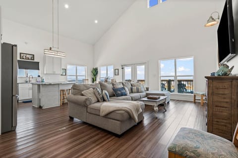 Salty Seahorse Living Room with Pool and Water View