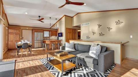 Large, open living room with deep, comfortable couch; seating for up to 14 ppl.