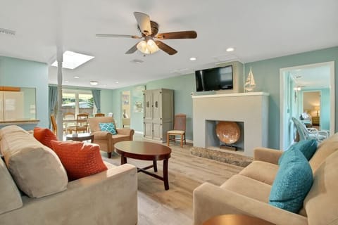 Living Room with pull out queen size sofa and 43" TV