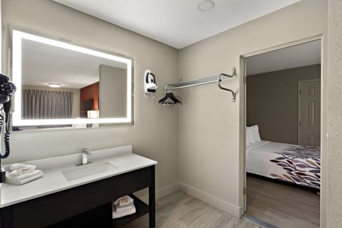 Deluxe Room (3 Queen Beds, Smoke Free) | Desk, blackout drapes, iron/ironing board, cribs (free)