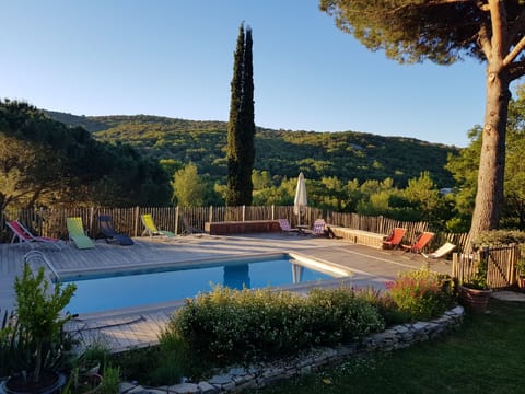 Outdoor pool, pool umbrellas, sun loungers