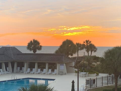 Balcony View of Sunrise Over the Ocean
