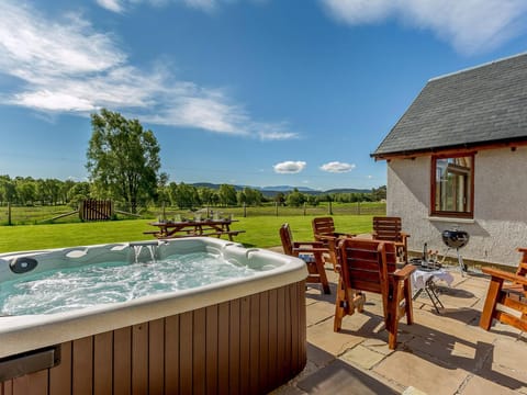 Inviting, private hot tub | Sunnyside House, Carrbridge, near Aviemore