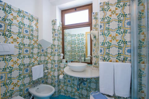 Free toiletries, hair dryer, bidet, towels