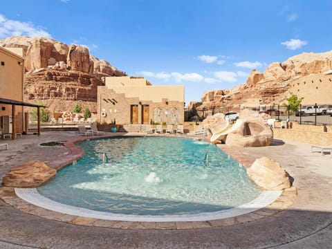 Outdoor pool, open 8:00 AM to 10:00 PM, sun loungers