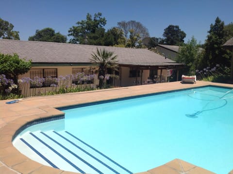 Pool at the rear of the house in very private garden 