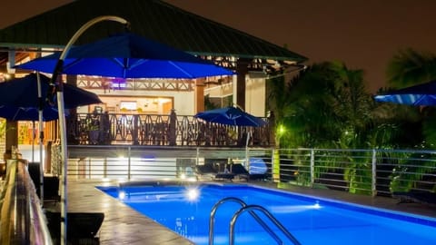 Outdoor pool, open 6:00 AM to 10:00 PM, pool umbrellas, sun loungers