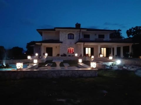Front of property - evening/night