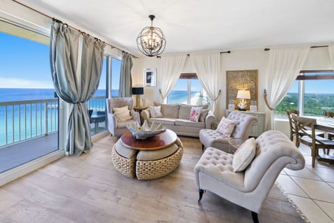 Sink into plush seating while breathtaking ocean views fill every window of your elegant living space.