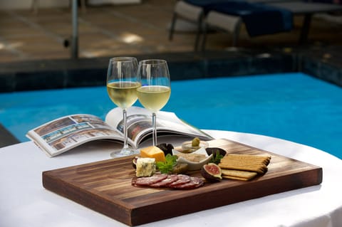 Outdoor pool, pool umbrellas, sun loungers