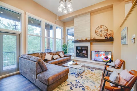 mountain view living room with balcony and patio
