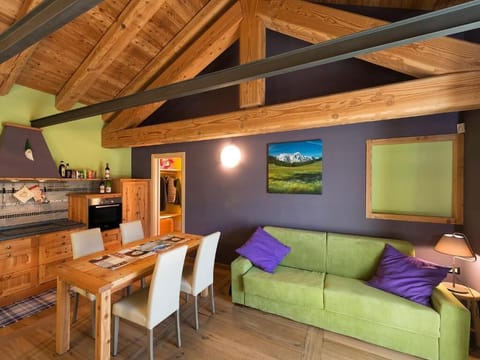 Apartment, 1 Bedroom (Il Melo) | Living area | LED TV, heated floors