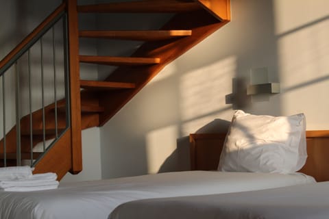 Duplex (4 bed) | In-room safe, desk, laptop workspace, blackout drapes